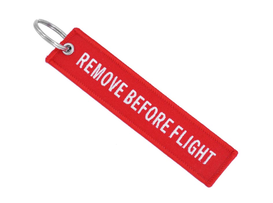 Remove before flight keychain